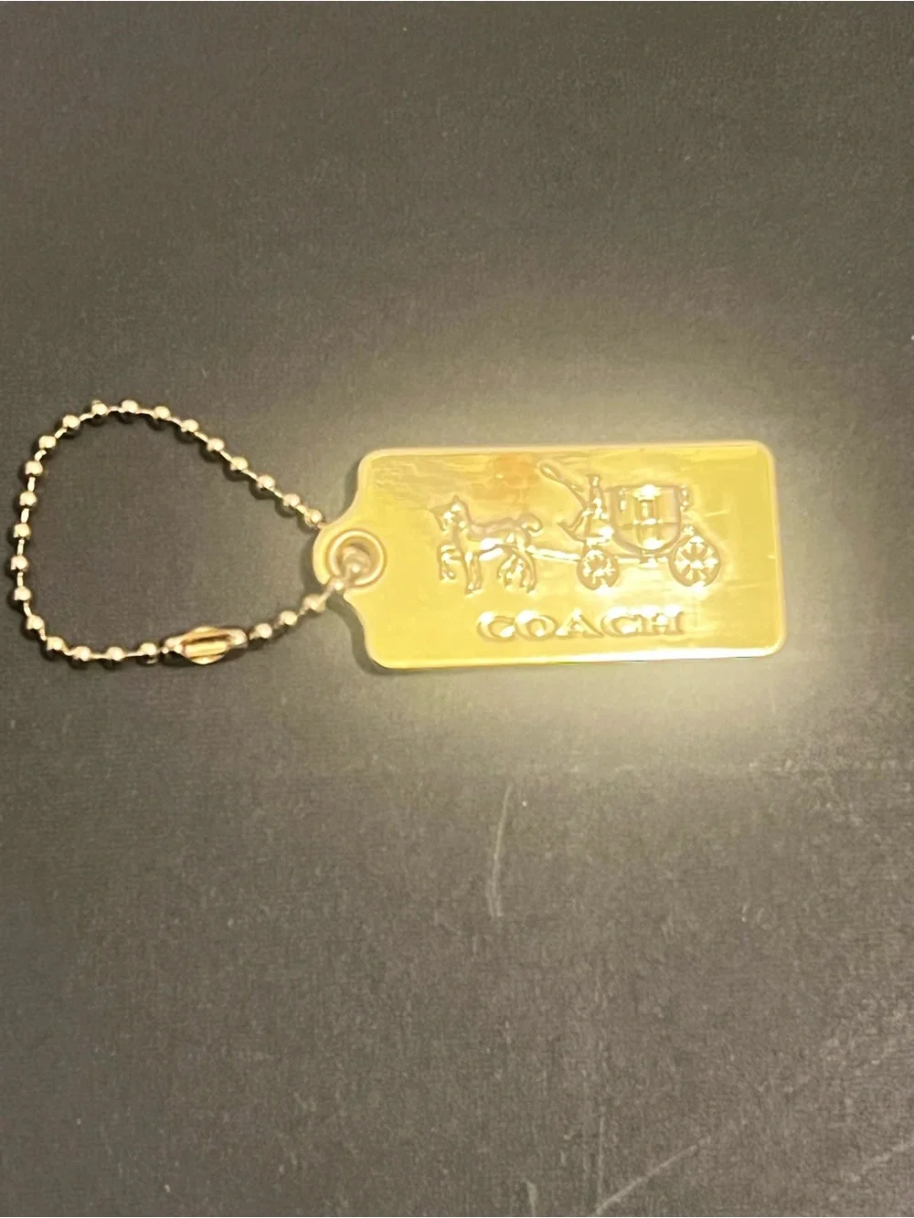 Rare Vintage Coach Gold Tone Embossed Horse & Carriage Dog-Tag Key Holder